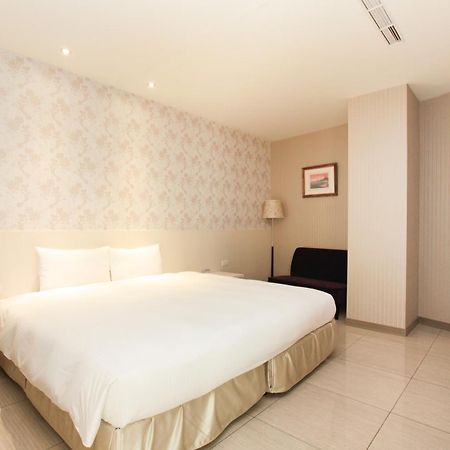 Larchotel Shanhua Habitación foto