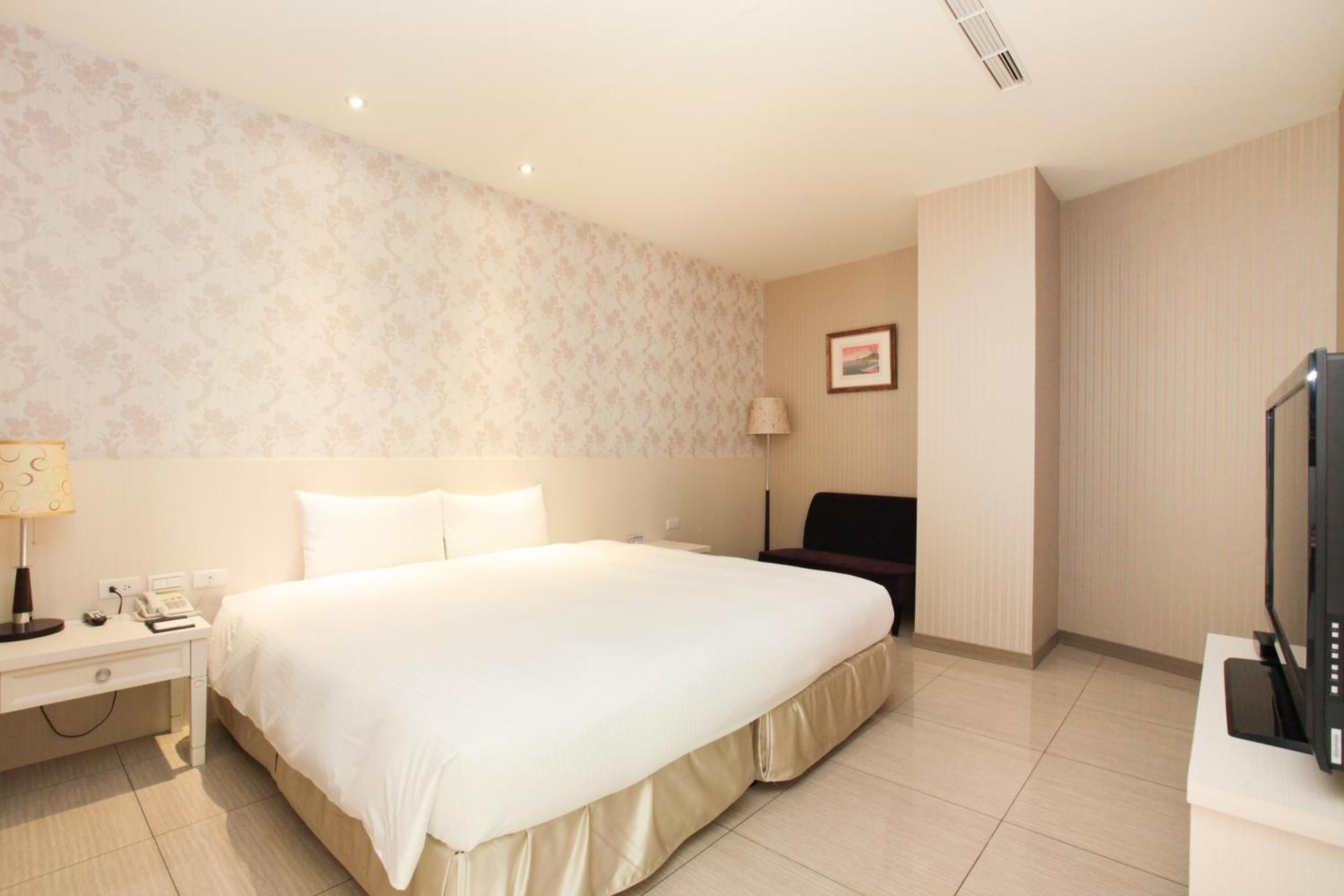 Larchotel Shanhua Habitación foto