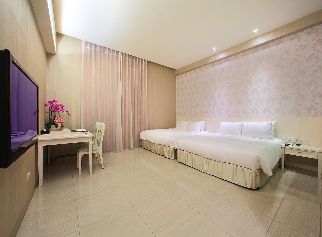 Larchotel Shanhua Habitación foto